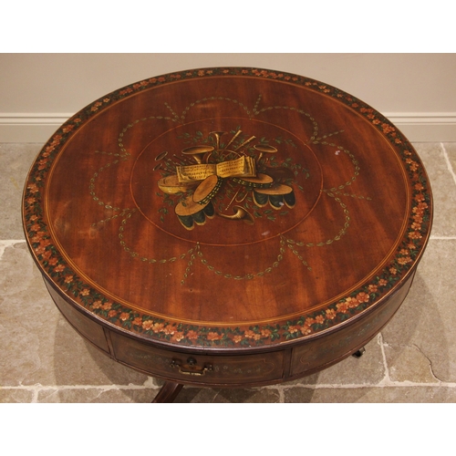 936 - A George III mahogany drum table in the manner of Sheraton, the circular top centred with a polychro... 