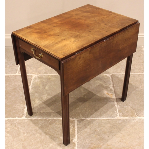 959 - A George III mahogany Pembroke table, the rectangular cross banded top with two leaves above a singl... 