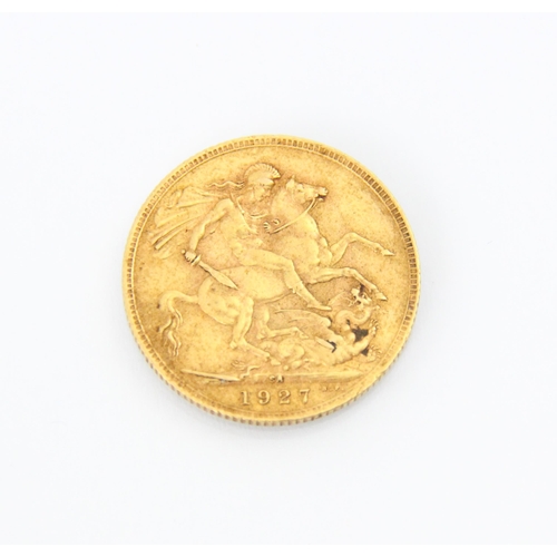 99 - A George V full sovereign, dated 1927, 8gms