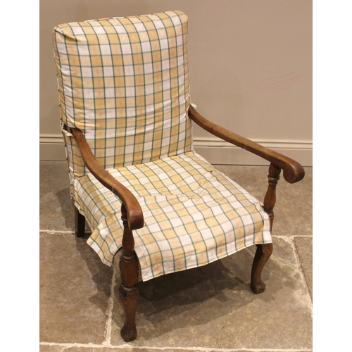 993 - A beech framed open armchair, late 19th/early 20th century, the rectangular upholstered back extendi... 