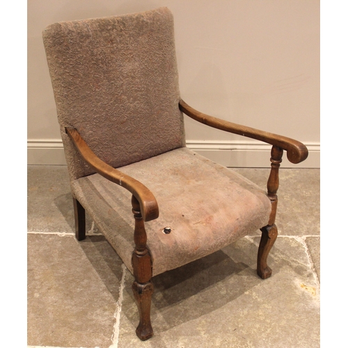 993 - A beech framed open armchair, late 19th/early 20th century, the rectangular upholstered back extendi... 