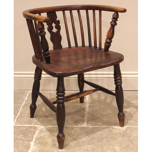 997 - A 19th century ash and elm Windsor captains chair, with a 'U' shaped top rail, stick back and pierce... 