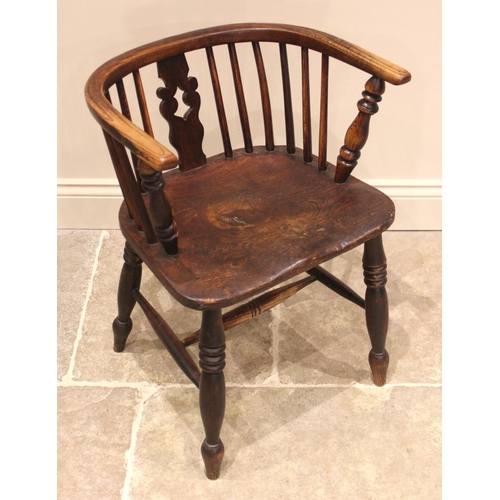 997 - A 19th century ash and elm Windsor captains chair, with a 'U' shaped top rail, stick back and pierce... 