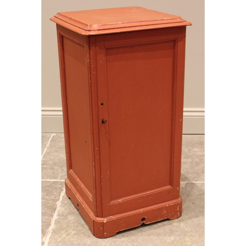 998 - A Victorian painted pine pot cupboard, the moulded top over a panelled door opening to a single shel... 