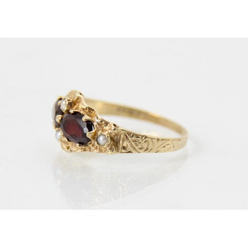 227 - A selection of three rings, to include a Victorian style 9ct yellow gold garnet and seed pearl set r... 