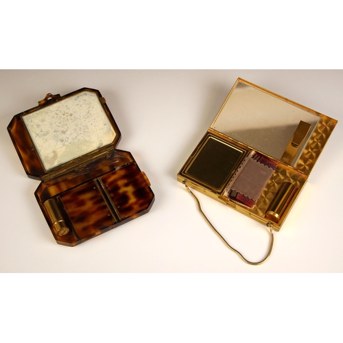 323 - An Art Deco style gold coloured evening bag/vanity case, of rectangular form, decorated with a styli... 