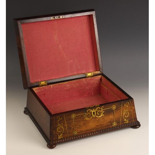 881 - A William IV rosewood and brass inlaid sarcophagus shaped work box, opening to a vacant interior (la... 