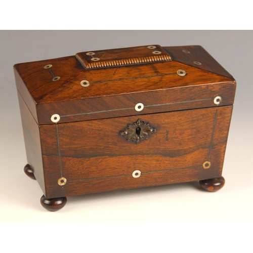 882 - A William IV rosewood and mother of pearl inlaid tea caddy, of sarcophagus form, the mother of pearl... 