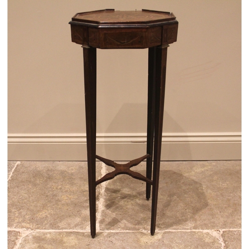 1050 - An inlaid mahogany plant stand, late 19th/early 20th century, the octagonal top inlaid with a flower... 