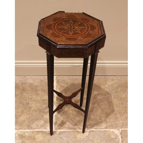 1050 - An inlaid mahogany plant stand, late 19th/early 20th century, the octagonal top inlaid with a flower... 