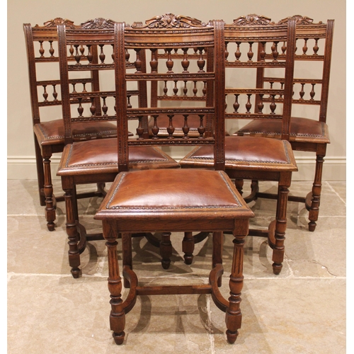 1053 - A French walnut country dining table, early 20th century, the polished rounded rectangular top raise... 