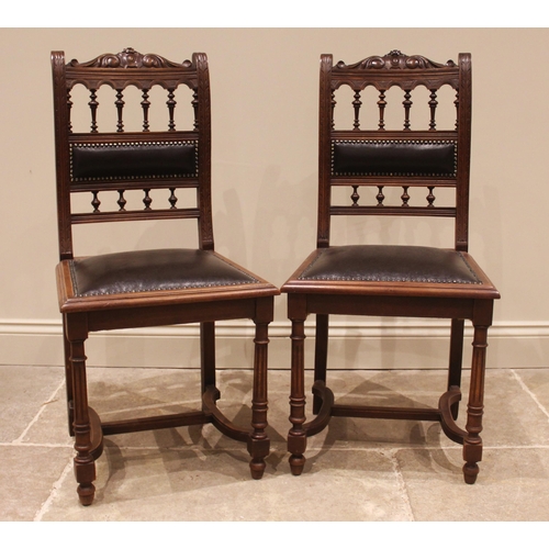 1053 - A French walnut country dining table, early 20th century, the polished rounded rectangular top raise... 