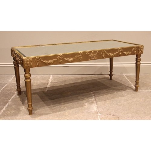 1054 - A painted giltwood coffee table, in the 18th century Italian taste, the rectangular bevelled mirror ... 