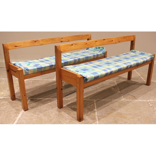 1065 - A pair of Habitat pine benches, late 20th century, each with a wavy rail back, upon legs of square s... 