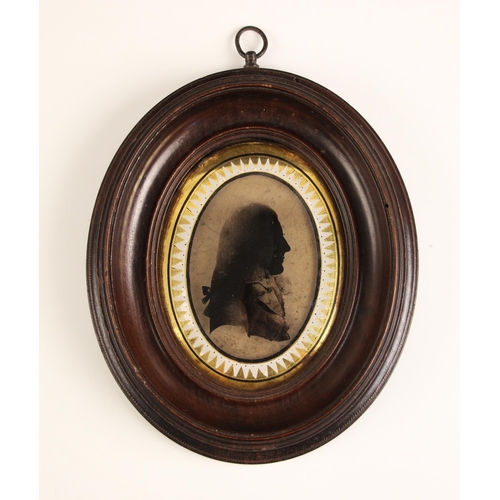 333 - English school (late 18th century),  
An oval bust length portrait silhouette in the manner of Isabe... 