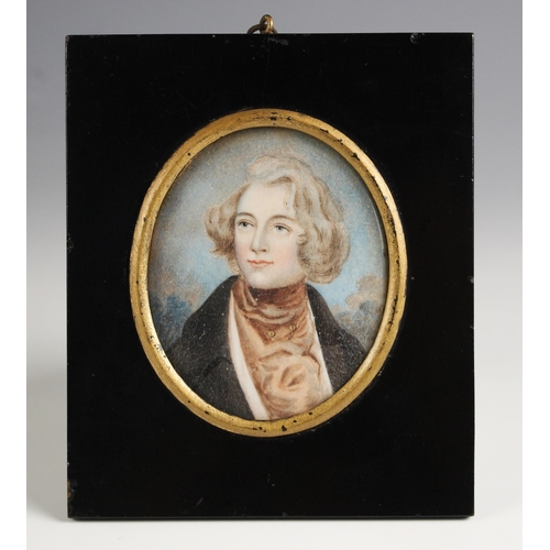 339 - English school (mid 19th century),  
A bust length portrait miniature depicting a young gentleman in... 