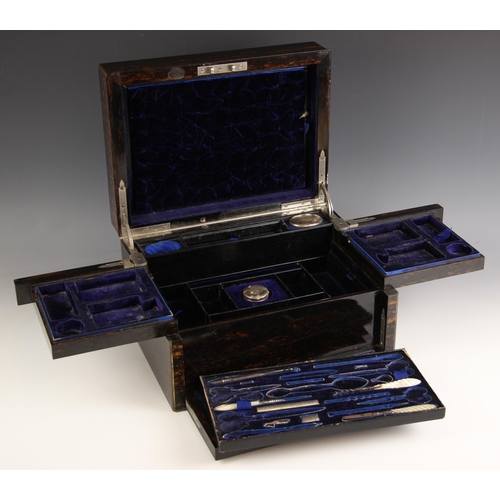 884 - A coromandel work/vanity box, mid 19th century, the hinged monogrammed cover opening to revolving an... 