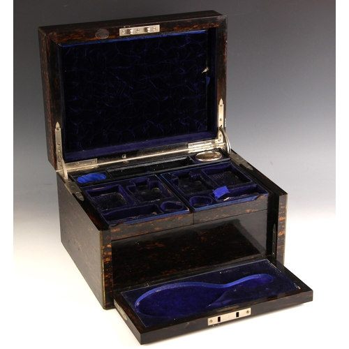 884 - A coromandel work/vanity box, mid 19th century, the hinged monogrammed cover opening to revolving an... 