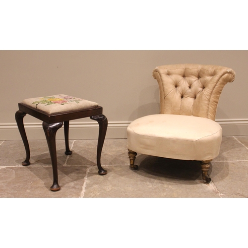 971 - A Victorian low seat upholstered chair, the bow front sprung seat upon gilt wood vase shaped front l... 