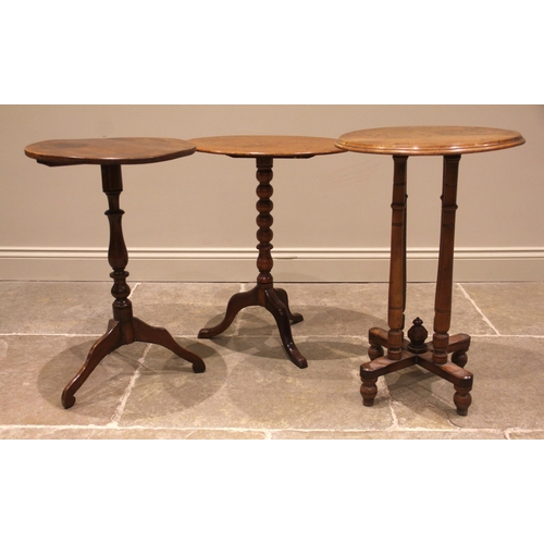 986 - Three 19th century wine/occasional tables, to include an example with a circular moulded top upon fo... 