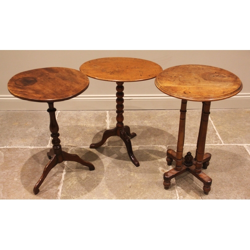 986 - Three 19th century wine/occasional tables, to include an example with a circular moulded top upon fo... 