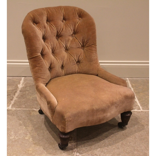 990 - A Victorian button back child's chair, the arched padded back over a sprung serpentine seat, upon va... 