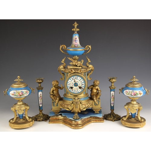 892 - A French Louis XVI style ormolu and Sevres type bleu celeste porcelain inset mantel clock garniture,... 