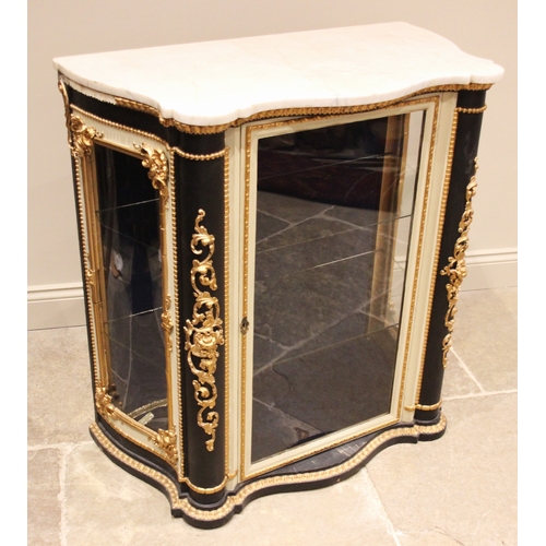 1012 - An Italian ebonised and painted marble top vitrine, 19th century, of serpentine form, the glazed cab... 