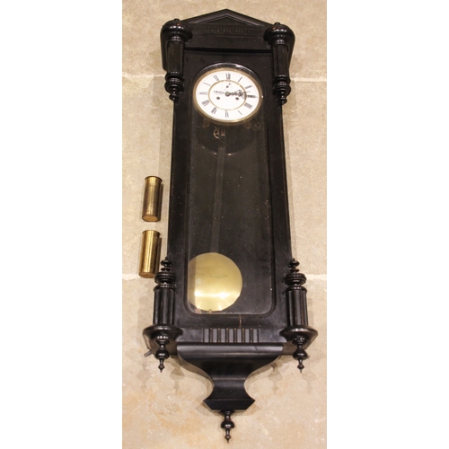 889 - A Victorian ebonised cased twin weight Vienna wall clock, the architectural case with fluted pilaste... 