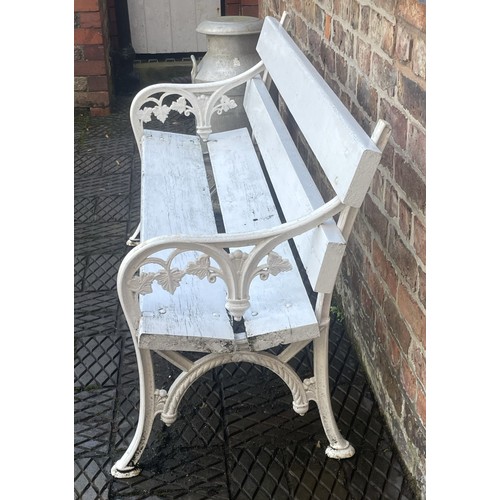 863 - A painted Coalbrookdale style cast iron and hardwood garden bench