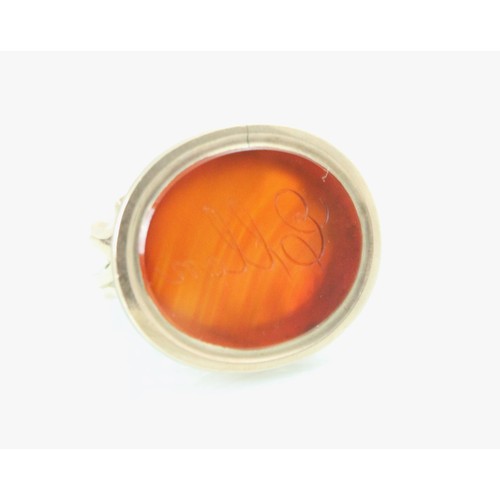 144 - A 20th century carnelian set seal fob, the oval intaglio with engraved 'Ellen' to centre, set within... 