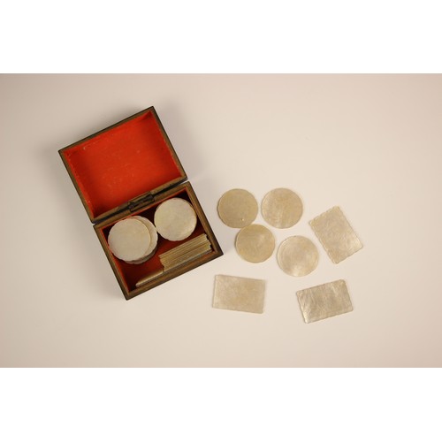 330 - A collection of mother of pearl engraved game tokens, 19th century, of various sizes, within four la... 