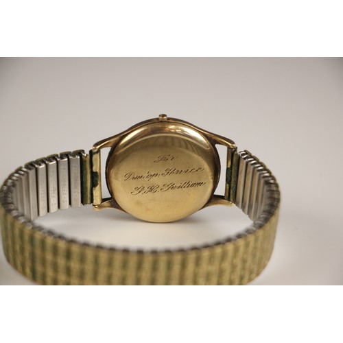 115 - A 9ct yellow gold Garrard wristwatch, the circular dial with Arabic numerals and subsidiary dial to ... 