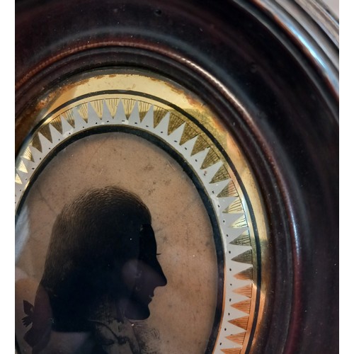 333 - English school (late 18th century),  
An oval bust length portrait silhouette in the manner of Isabe... 