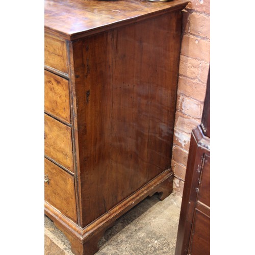 907 - A burr elm chest of drawers, early 18th century, the quarter veneered and cross banded top over an a... 