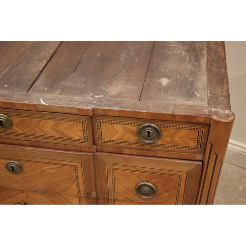 1016 - A French Louis XVI style walnut and kingwood marble top commode chest, late 19th century, the break ... 