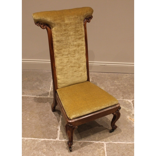 1019 - A Victorian rosewood framed prie-dieu chair, upholstered in golden velour, the high back with carved... 