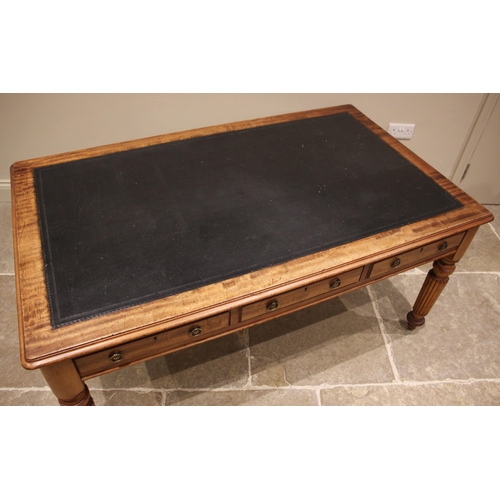 1030 - A large Victorian mahogany writing desk, the rectangular moulded top with inset leather skiver above... 