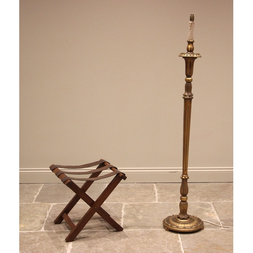 1040 - A mahogany 'X' frame folding luggage stand, early 20th century, applied with three leather retaining... 