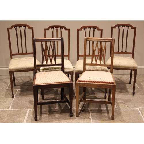 1044 - A set of four Edwardian mahogany and satinwood banded dining chairs, each with a pierced rail back, ... 