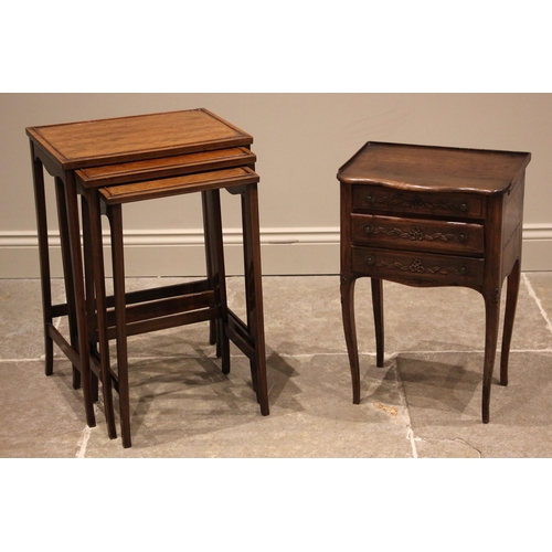 1045 - A mahogany nest of three tables, early 20th century, the rectangular table tops with 'lozenge' parqu... 