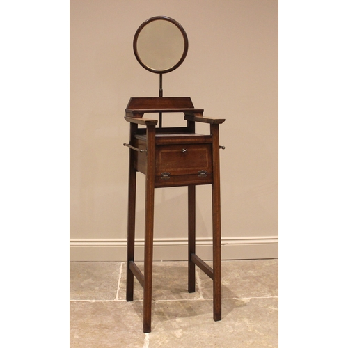 1049 - An Edwardian mahogany and marble top shaving stand stand, the adjustable circular mirror over a marb... 