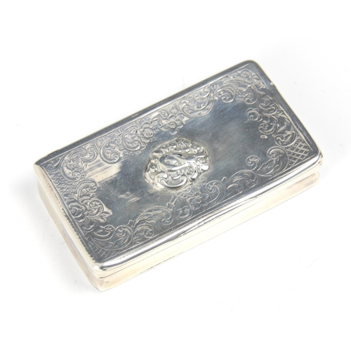 113 - A continental white metal trinket box, the rectangular hinged cover with engraved floral border and ... 