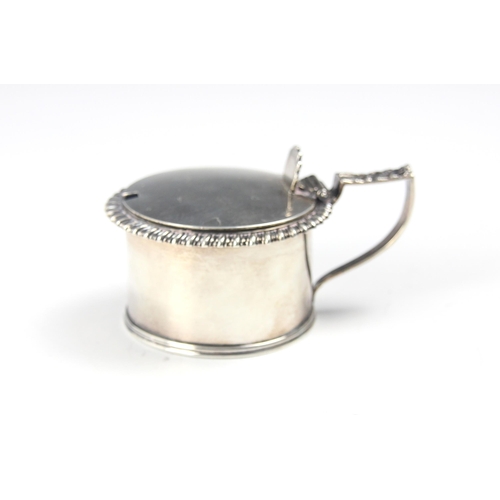 119 - A George III silver wet mustard, Rebecca Emes & Edward Barnard I, London 1819, the shaped thumbpiece... 