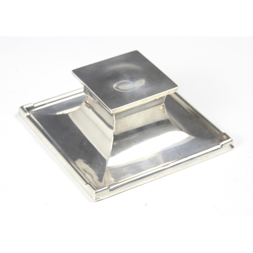 120 - A George V silver inkwell, A & J Zimmerman Ltd, Birmingham 1923, the square shaped hinged cover open... 