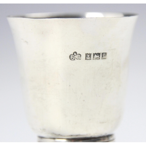 125 - A silver double spirit measure (jigger), Elkington and Co, Birmingham 1964, of plain polished form w... 