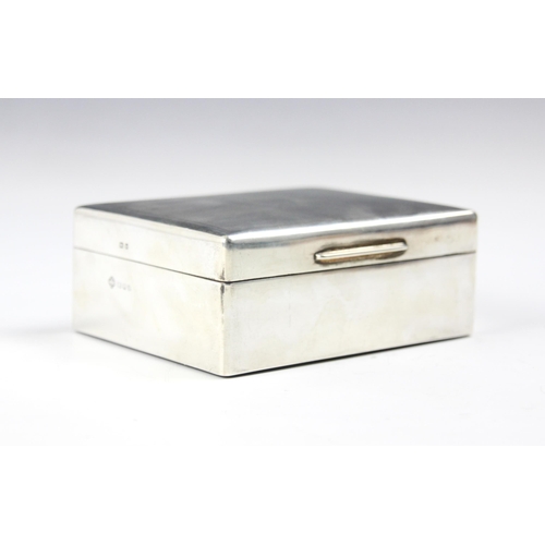 126 - A silver mounted cigarette box, Asprey & Co Ltd, London 1959, the engine turned hinged cover opening... 