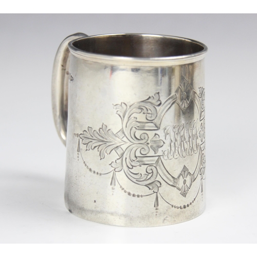 133 - An Edwardian silver christening mug, Walker and Hall, Sheffield 1903, the loop handle above a tapere... 