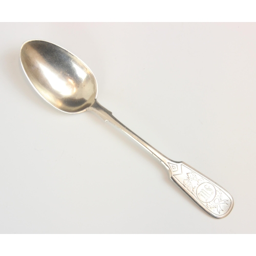 143 - A Russian silver Imperial fiddle pattern dessert spoon, Ivan Khlebnikov, c1880, the engraved termina... 