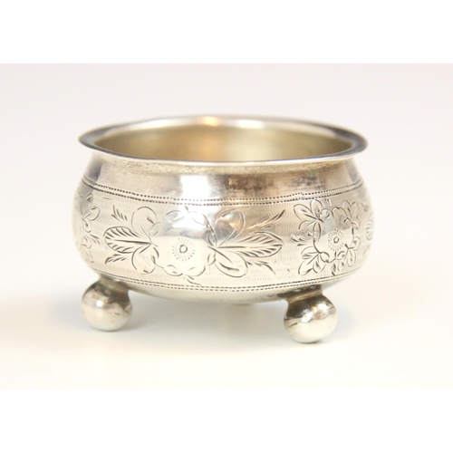 146 - A Russian silver open salt, Fyodor Ivanov, Moscow c1876, of cauldron form with engraved floral decor... 